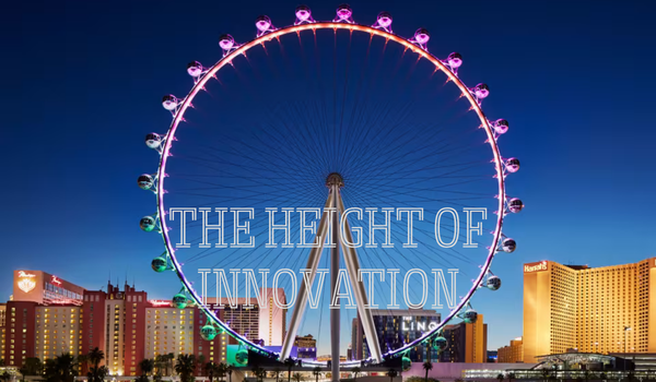A large illuminated Ferris wheel stands against a twilight sky with city buildings in the background and the words "THE HEIGHT OF INNOVATION" overlaid on the image.