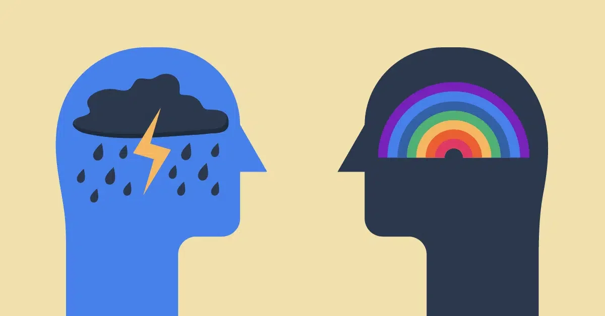 A graphic depicting two opposing emotional states. The blue silhouette on the left has a storm cloud with raindrops and a lightning bolt inside the head, symbolizing sadness or distress. The dark silhouette on the right has a rainbow within the head, representing happiness or positivity.