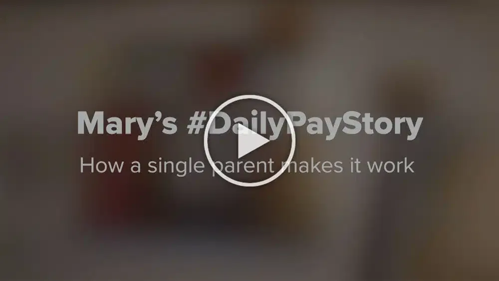 Video titled 'Mary’s #DailyPayStory: How a single parent makes it work' with a play button in the center.