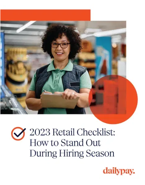 A person with curly hair and glasses holds a clipboard in a retail store. Text reads: "2023 Retail Checklist: How to Stand Out During Hiring Season." DailyPay logo is present.